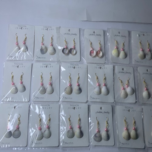 خرید گوشواره مُروارید صورتی عمده | وردسا