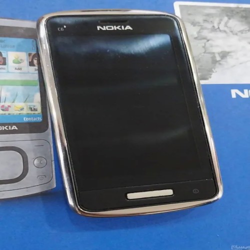 فروش نوکیا C6-01 با باتری و شارژر اصلی و خط وخش