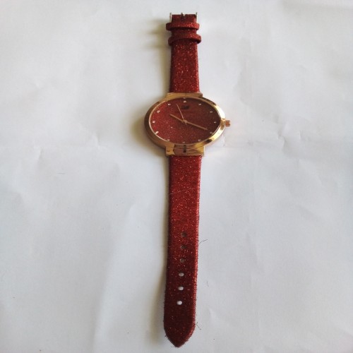 فروش ساعت مچی زنانه با بند پارچه ای و قاب طلایی