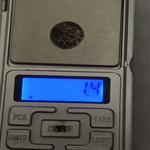 سکه نقره قدیمی 1/4 گرمی با ارزش تاریخی