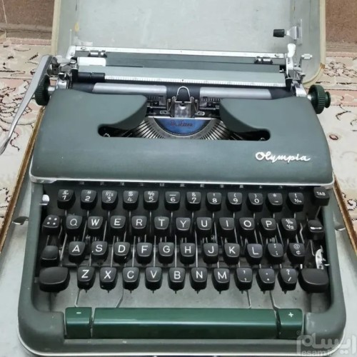 فروش دستگاه تایپ المپیا سبز ارتشی با کیف و هدیه