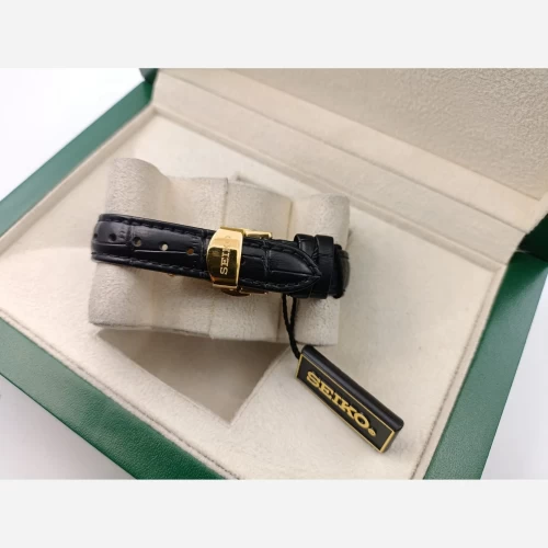 ساعت سیکو طلایی صفحه مشکی چرمی 7124 تک زنانه - Image 3