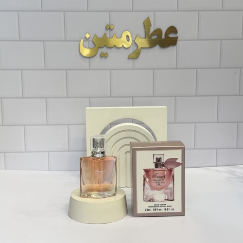 عطر ادو‌پرفیوم زنانه لانکوم لاوی است بل شرکت اسمارت کد ۳۸۷ حجم ۲۵ میل