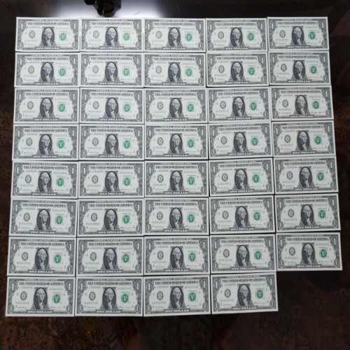 فروش 39 عدد اسکناس یک دلاری نو و آکبند